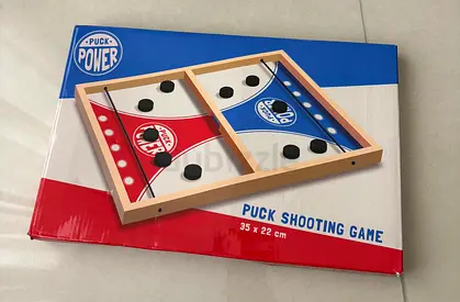 Puck shooting game