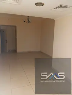 Annual rental opportunity: Two-bedroom apartment with a living room, suitable for families, in Al Nu