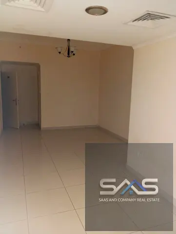 Annual rental opportunity: Two-bedroom apartment with a living room, suitable for families, in Al Nuaimiya 1