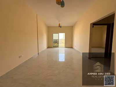Spacious 1BR apartment in Ajman, 2 bathrooms, balcony, central AC, parking, natural ventilation, free maintenance, near China Market, easy access to D