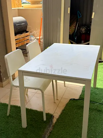 Minimalist White Dining Table with Chairs
