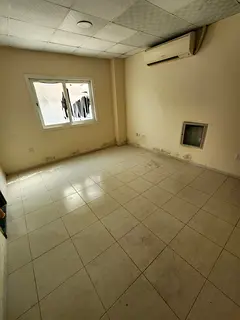 Studio for rent in Al Musalla – bachelors contract, practical layout in a lively area near markets