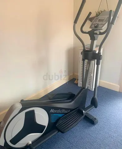NordicTrack Elliptical Trainer/ Lexco treadmill, upright, spinning bike package for 3500 aed