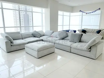 Pan Emirates pianca feather filled sofa with footstool