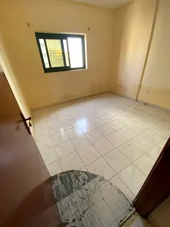 Two bedroom apartment with large living room and balcony for rent in Al Majaz central AC kitchen and
