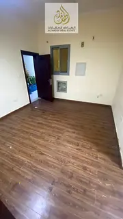 One bedroom, two living rooms, and a bathroom. Central air conditioning. Located on a main street. E