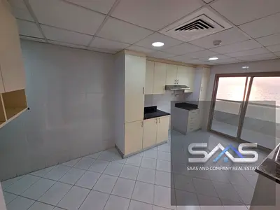 For rent: Three-bedroom apartment with a living room on the Corniche, spacious and elegantly designed, prime location for convenience.