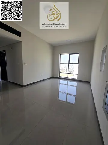 Two-bedroom apartment with a living room, three bathrooms, and a balcony. First occupancy. Largest space at the lowest price. Located on Sheikh Mohamm