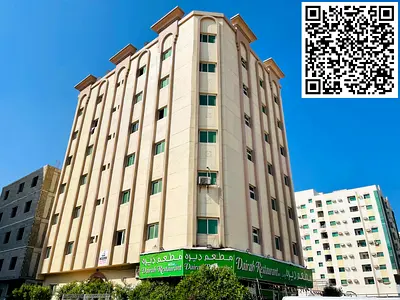 For sale: Building in Al Naba'a area, Sharjah, Al Sharq district, corner plot on two streets, area 3210 sq ft. The building consists of a ground floor