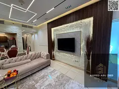 Two master bedrooms, large living room, spacious kitchen, three bathrooms, laundry room, balcony wit