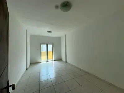 Two rooms and a large living room, two balconies, built-in wardrobes in Rashidiya 3