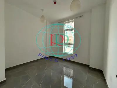 1 BR HALL FLAT WITH SPLIT DUCTED A/C AVAILABLE IN AL ZAHIA AREA NEAR ZAHIA CITY CENTER