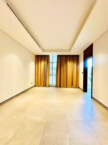 Villa for rent in Al Hooshi area, Sharjah. It consists of 4 master bedrooms, a living room, a majlis (formal sitting room), a maid's room, and a kitchen. Annual rent is AED 175,000 (negotiable).