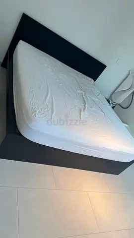 Ikea king size bed with mattress underneath 2 storage drawers available in perfect