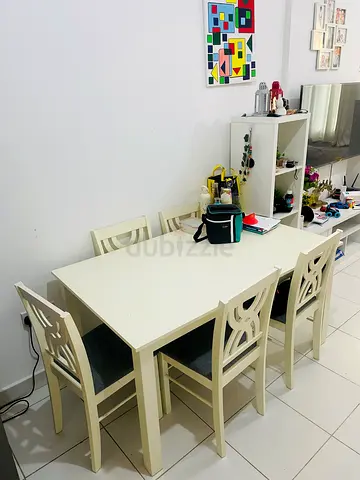 White Dining Table with 6 Chairs 600 aed full set