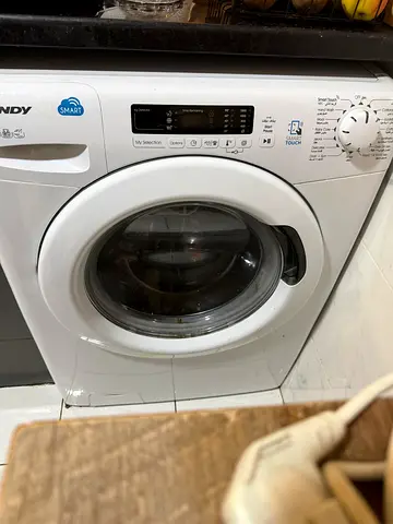 Selling 9 kg  front loaded Candy washing machine and Dryer