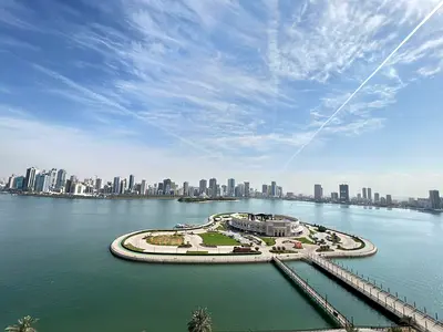 Annual rent in Sharjah, Al Majaz 3: Four bedrooms, maid's room, five bathrooms, laundry room, two balconies, sea view, gym, swimming pool, parking,