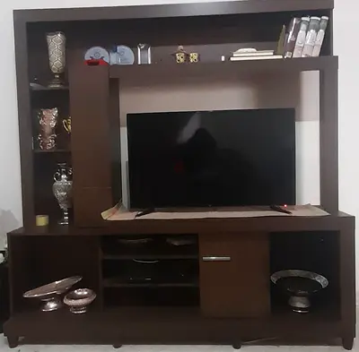 Stylish Wooden Entertainment Center with shelf.
