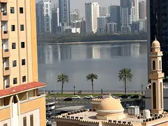 **Great opportunity in Al Khan – 2BR apartment with 1 bath and balcony view, close to schools, mal