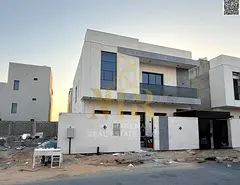 Luxury villa for sale in Al Zahia, Ajman. 6 bedrooms, roof terrace. Includes electricity, water, and