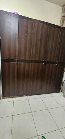 Queen size Bed + 2 side Tables + Dressing Table + 5 door Wardrobe.