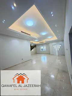 Very nice villa for rent in al warqaa ( 5bedroom + hall + majlas + parking + service block )