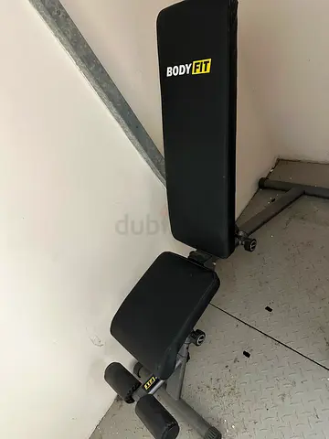 Gym bench with dumbbells