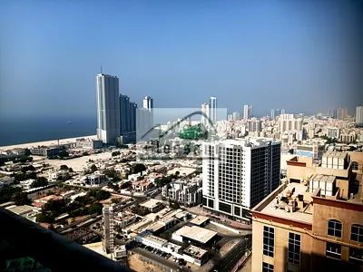 Ajman One Towers: Spacious Sea View 2 Master Bedrooms Hall higher Floor with Parking For Rent
