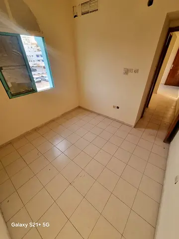 Studio for rent in Sharjah Al Nasseriya large space for bachelors prime location near all services yearly rent 23000 AED or 2000 monthly payment in 4