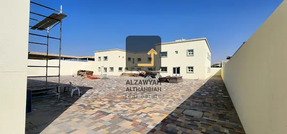 💼 Guaranteed Investment in the Heart of Al Sajaa Industrial Area – Workers' Accommodation + Rented Shops