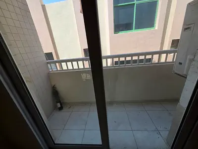 Sky Bridge Real Estate is pleased to offer a Spacious 2 Bedroom Hall Apartment in Bu Tina, Sharjah