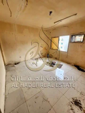 🏠 One-Bedroom Apartment with Living Room for Annual Rent in Al Butina, Sharjah – Prime Location Close to Services and Public Transportation