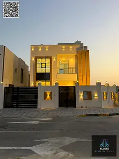 A luxurious corner villa on two streets, featuring a modern design, high-end finishes, and a garden,