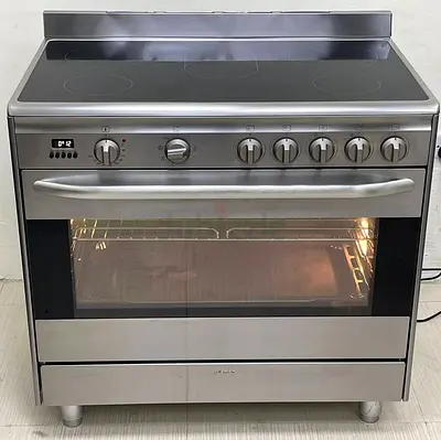 Smeg brand 5 burner electric cooker like new condition perfect working 90cm latest model more detail