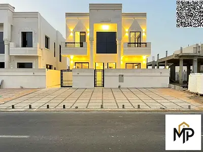 Villa for sale, including registration, ownership, and electricity fees, on the main street, ready to move in, in one of Ajman's most prestigious area