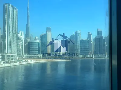 High-Demand / HOT DEAL 2.35 million Hurry / Investor Deal /Waterfront Office /Canal and Burj View / Rented 2 Parking