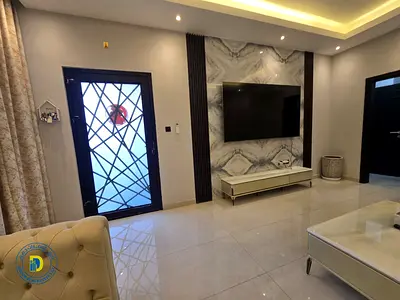 Luxury furnished villa for rent in a prime location in Al Yasmin, 6 rooms and a rooftop terrace, high-end finishing at an unbeatable price.
