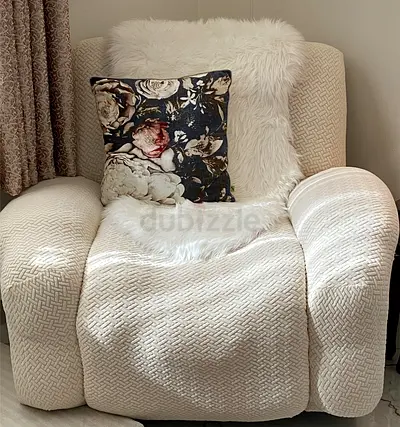 Cozy Recliner Chair with Floral Pillow