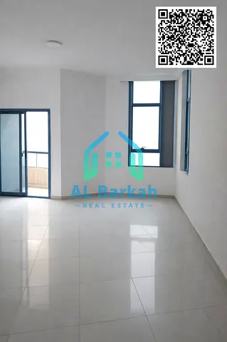A luxurious apartment for sale in Al Khor Towers, featuring a prime location and a stunning view. It includes two bedrooms, a spacious living room, hi