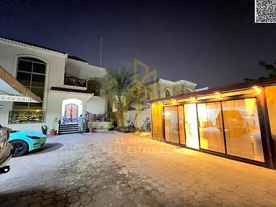 Villa for sale in Al Rawda 3, 6200 sq ft, price includes electricity, water, and air conditioning. Freehold ownership for all nationalities. Strategic