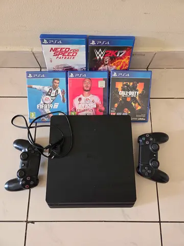 PlayStation  4 500GB with power cable plus 2 Controllers  along with 6 Games