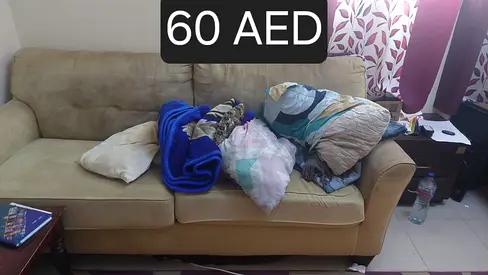 Comfortable Sofa with Cushions and Blankets