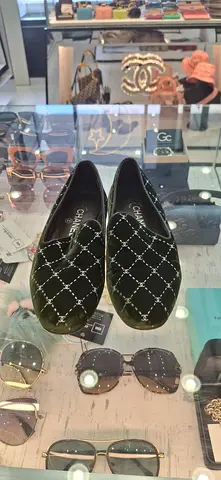 Chanel Black Flats with Signature Design