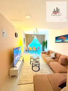 Sharjah, Al Taawun area: Two bedrooms, living room, kitchen, two bathrooms, and balcony. Price: 5500