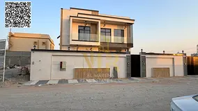 A spacious villa behind Al Hamidiya Park, 3 floors, central air conditioning, large garden, no fees.