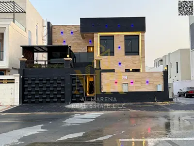 Luxury villa for sale in Al Zahia – 6 master bedrooms with a majlis, living room, and modern kitchen, two floors and a roof, and includes all services
