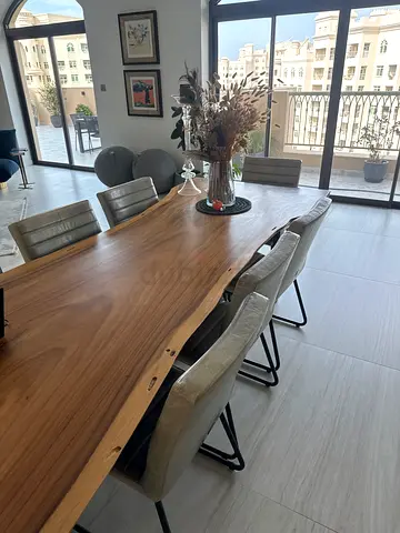 Stylish Dining Table with Unique Wooden Finish from Marina home