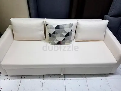 Comfortable Modern Sofa-bed with Decorative Cushions