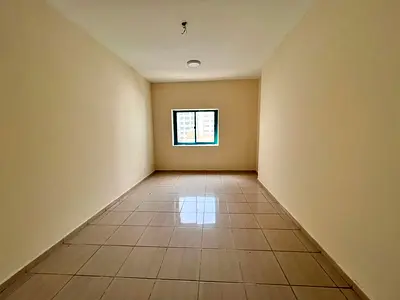 Balcony with an open view and spacious layout, in a prime and vibrant location close to all services such as cafés and shops, and near the Dubai exit.