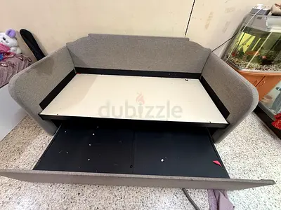 Compact Grey Sofa with Hidden Storage